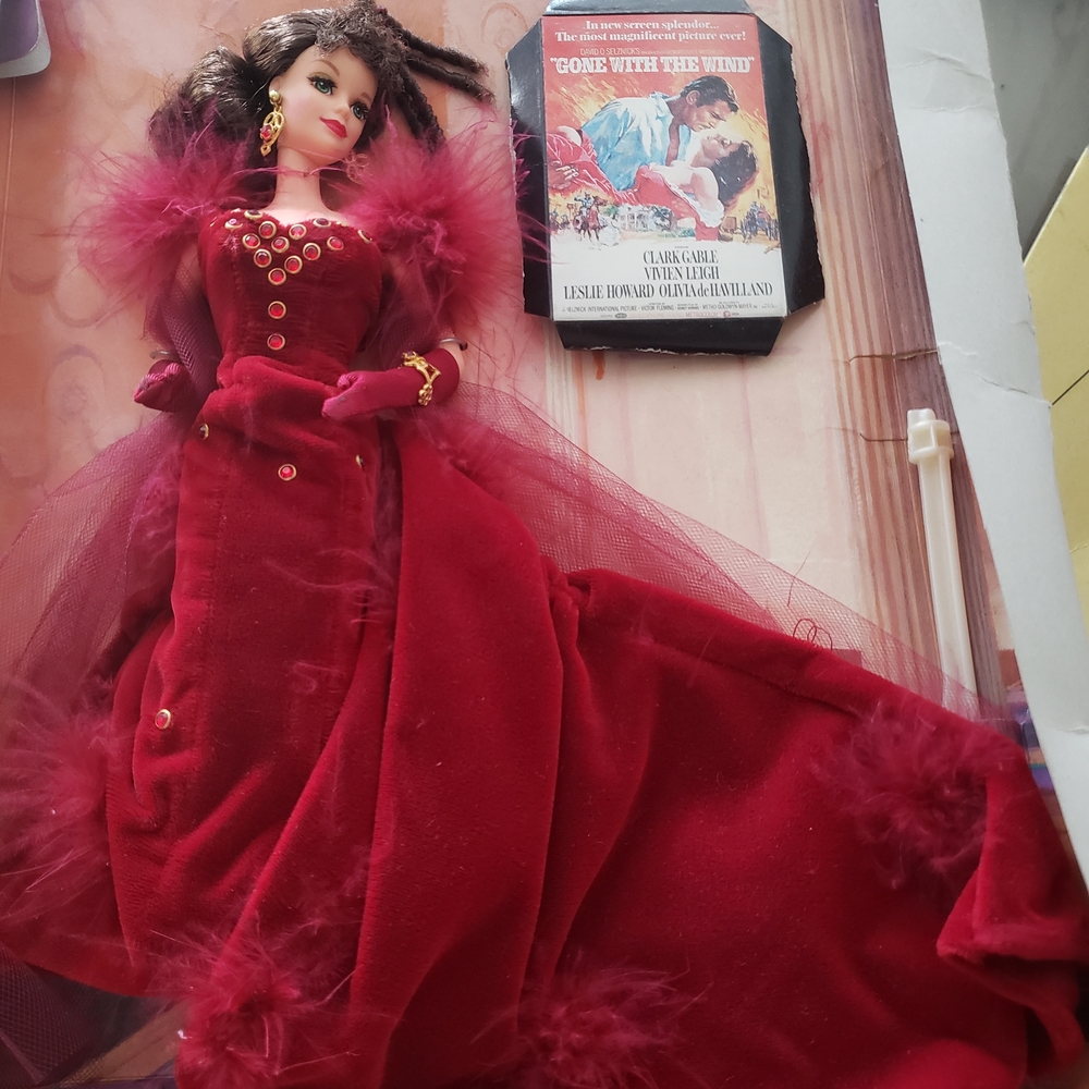 Elegant Red Doll with Feather Details